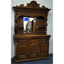  19th century continental oak bevel edged mirror back sideboard, projecting cornice, carved frieze with man and woman figural supports, two ogee front drawers and two cupboard doors depicting various tavern scenes, turned bun feet, W163cm, H216cm, D59cm  