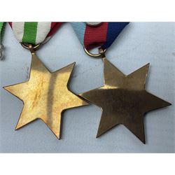 WW2 group of four medals comprising 1939-1945 War Medal, Defence Medal, Italy Star and 1939-1945 Star; with Royal Army Service Corps cap badge and RASC chrome and enamel sweetheart brooch