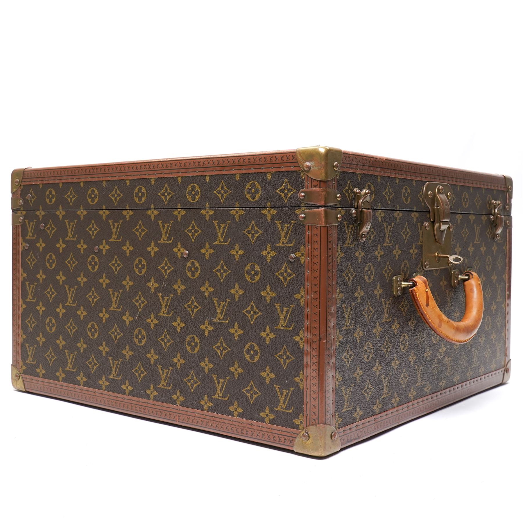 Mid-20th century Louis Vuitton monogram cabin trunk,  monogram canvas with lozine trim and brass mounts, single front leather handle with lock stamped Louis Vuitton with key code 1080701, the interior fitted with original webbing straps and lift-out tray, label to lid printed 'Avenue Marceau 78bis - Paris Nice - 2 Avenue de Suède' serial number 953998, circa1960s, with original key present

