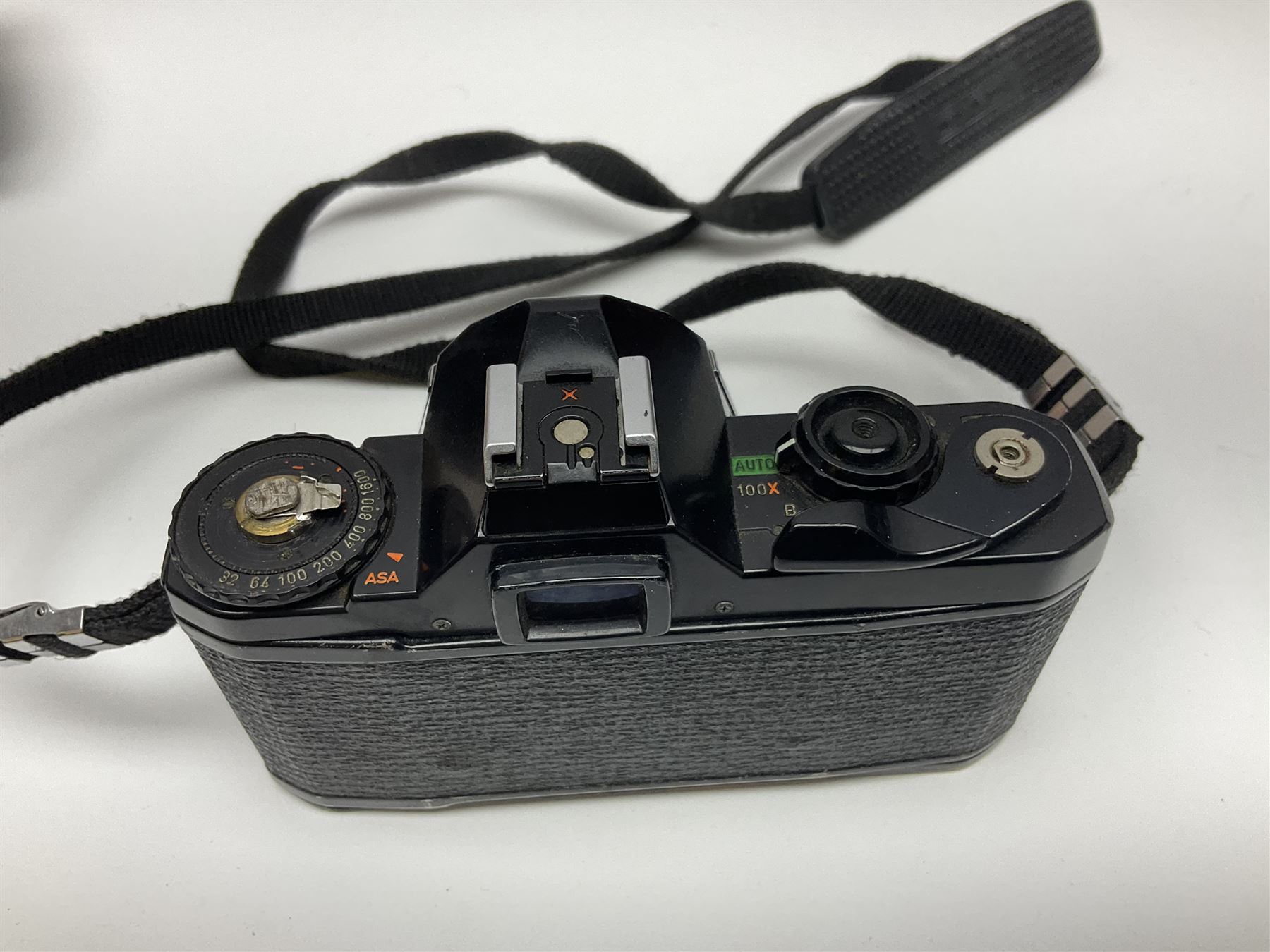 Four Minolta camera bodies, to include Dynax 500si, serial no. 94812651 with 'Signa Zoom 1;3.5-4.5 f=28-70mm' lens, Maxxum 300si, serial no. 97821665, with 'Tamron AF 80-210mm' lens and Dynax 300si, serial no 01603265'  with Minolta AF Power Zoom 35-80mm 1;4' lens, etc, together with Pantax MV1 camera bodies and other camera equipment 