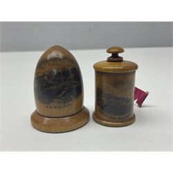 Six sewing related Mauchline ware comprising an oval reel box with internal label for Clark & Co's, tape measure, pin case and three thimble holders of ovoid form 