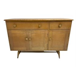 Lucian Ercolani for Ercol - Model 351 light elm and beech sideboard, fitted with three cupboards beneath one short and one long drawer