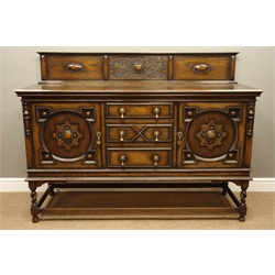  Early 20th century oak sideboard, raised back with relief carved strap work decoration, three drawers and two cupboards with geometric panels, barley twist supports connected by stretchers, W159cm, H118cm, D57cm  