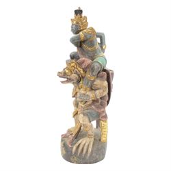 Hindu wooded sculpture depicting Vishnu riding on the shoulders of Garuda, H80cm