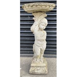 Composite stone bird bath of child holding bouquet on square base