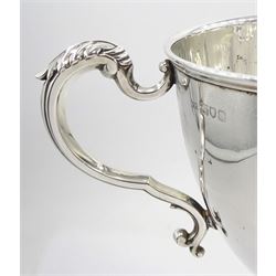 Early 20th century silver trophy cup, the plain bowl upon a circular spreading foot, with twin acanthus capped scroll handles, hallmarked Mappin & Webb Ltd, London 1913, H19cm, approximate weight 16.17 ozt (503 grams)