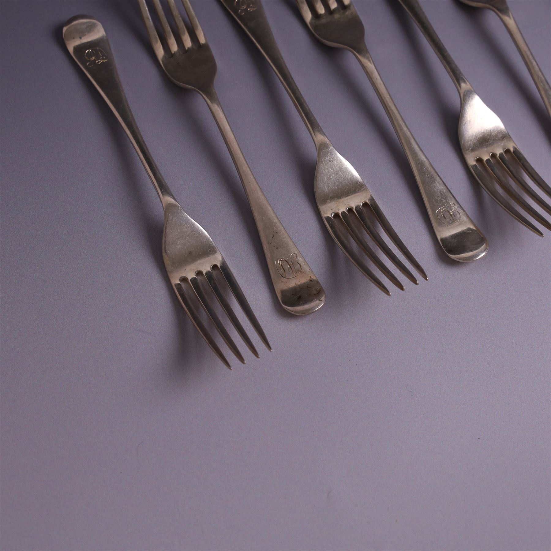 Three silver Old English pattern table spoons, including George III pair, and a set of six 1930s silver forks, all with engraved initials, all hallmarked