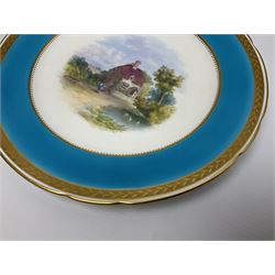 19th century Minton cabinet plate, with central hand painted rural scene with figure stood before a cottage, birds upon a lake to the fore, and church in the distance, within a turquoise border and tooled gilt rim, with impressed marks beneath, including year mark, probably for 1873, and painted pattern number in iron red A6802, D23cm, together with a 19th century Grainger & Co cabinet plate, with central hand painted loch scene, within a deep blue border and beaded gilt inner border and rim, with impressed mark beneath, painted pattern number 2490, and titled 'Loch Oich with Invergarry Castyle Invernessshire', D24cm