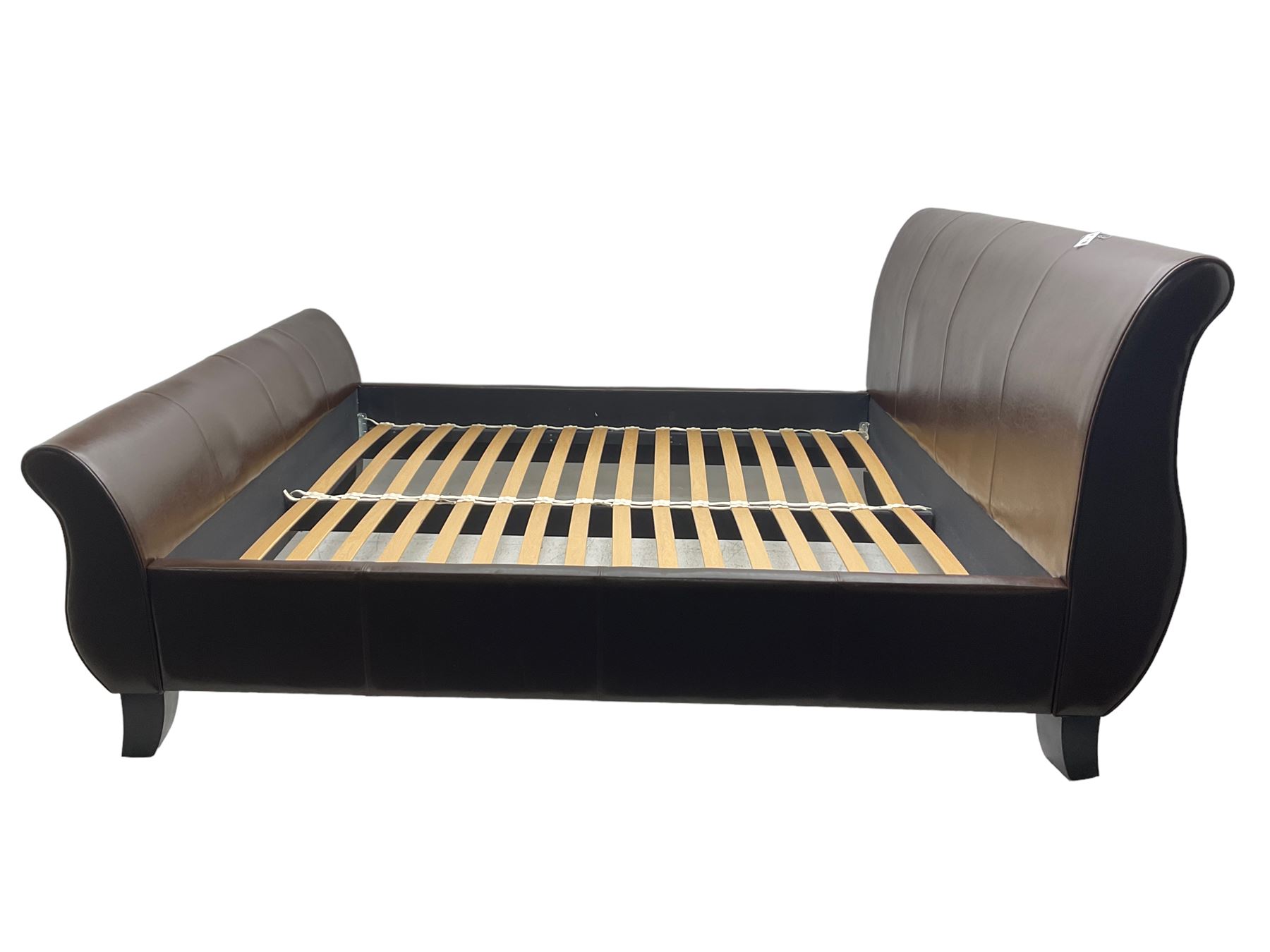 Super king 6' sleigh bed, upholstered in chocolate brown leather, with ebonised splayed feet