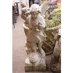  White marble model of a winged infant standing with flower bunches,  H80cm, W34cm, D30cm  