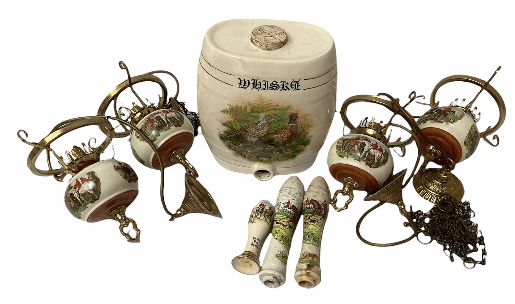 Ceramic hanging light fittings decorated with fox hunting scenes with brass fixtures, ceramic beer pulls decorated with hunting scenes and ceramic whisky barrel decorated with a pheasant
