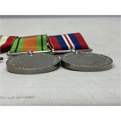 WW2 group of four medals comprising 1939-1945 War Medal, Defence Medal, Italy Star and 1939-1945 Star; with Royal Army Service Corps cap badge and RASC chrome and enamel sweetheart brooch