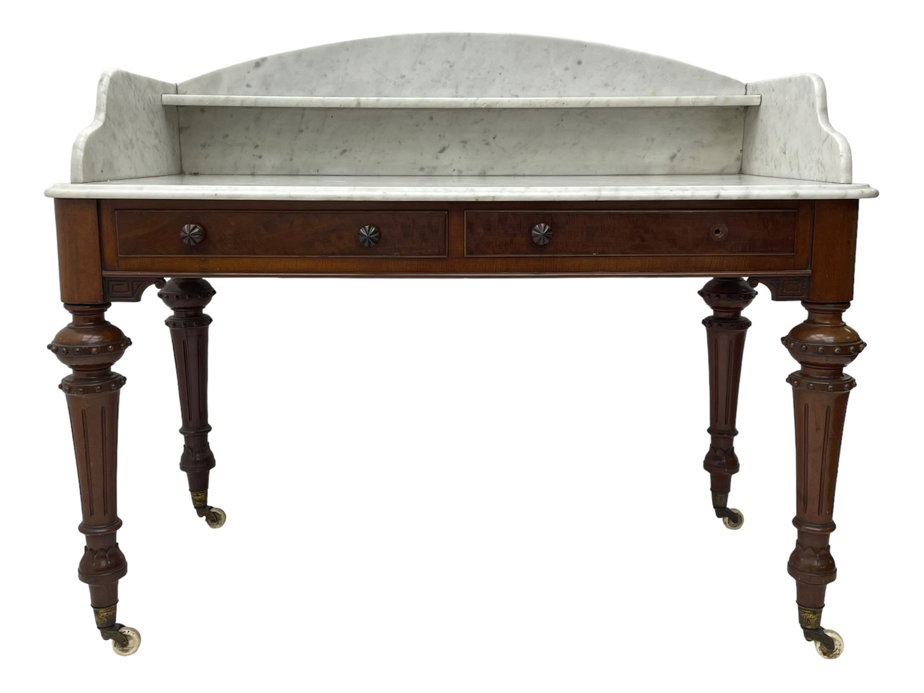 Victorian figured mahogany two-piece bedroom set - the washstand with white and black marble moulded top with arched back and raised shelf, two moulded frieze drawers, on turned and fluted supports with brass and ceramic castors (W123cm, D60cm, H102cm); the dressing table with raised swing mirror in moulded frame with shell and scroll carved pediment, on scrolled horns carved with foliage, four raised trinket drawers over moulded rectangular top, fitted with two drawers, on turned and fluted supports with brass and ceramic castors (W122cm, H177cm, D62cm)