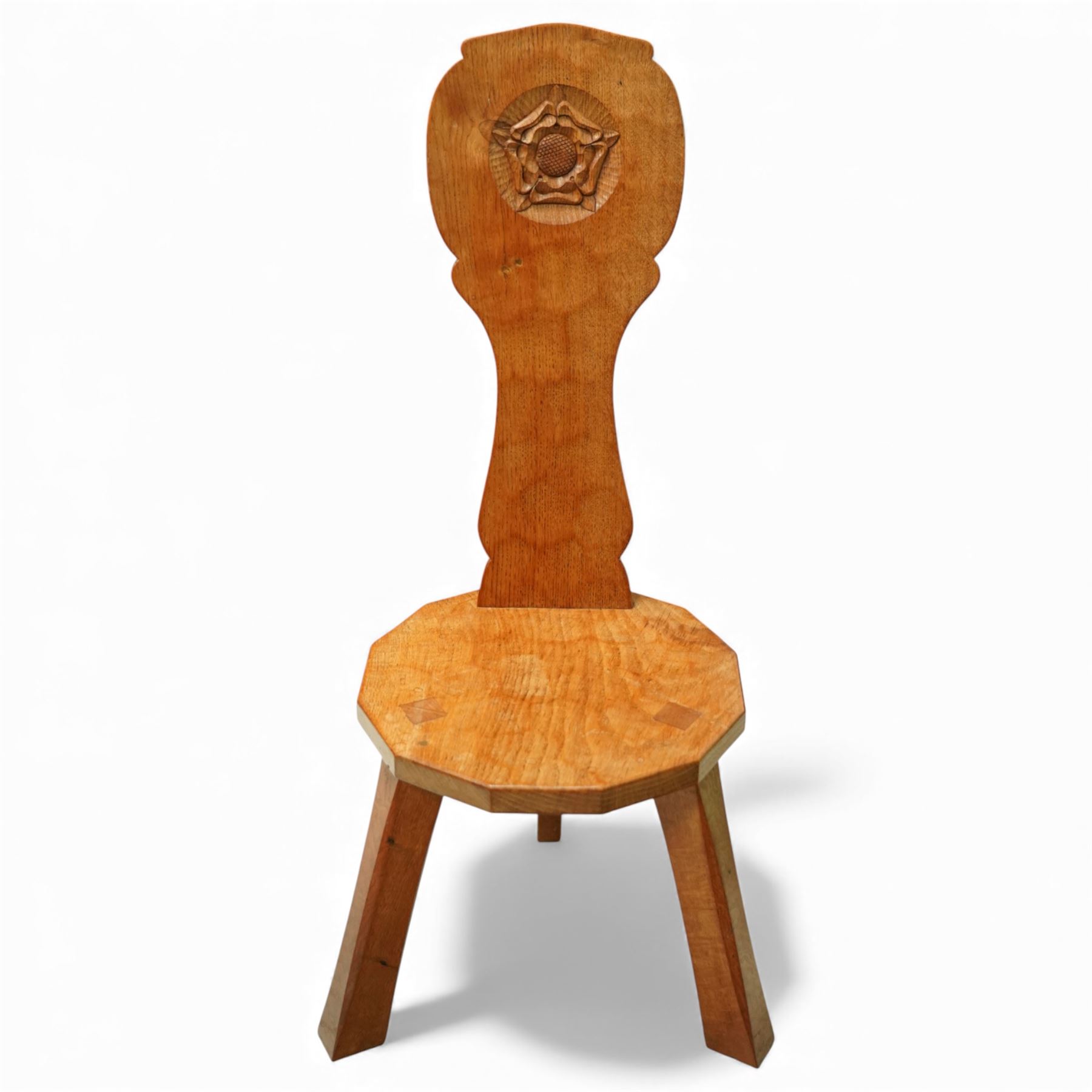 Gnomeman - oak spinning chair, shaped adzed back with carving of a Yorkshire rose, adzed seat with wedged through tenons, on square chamfered supports, signature carved Gnome by Thomas Whittaker of Littlebeck