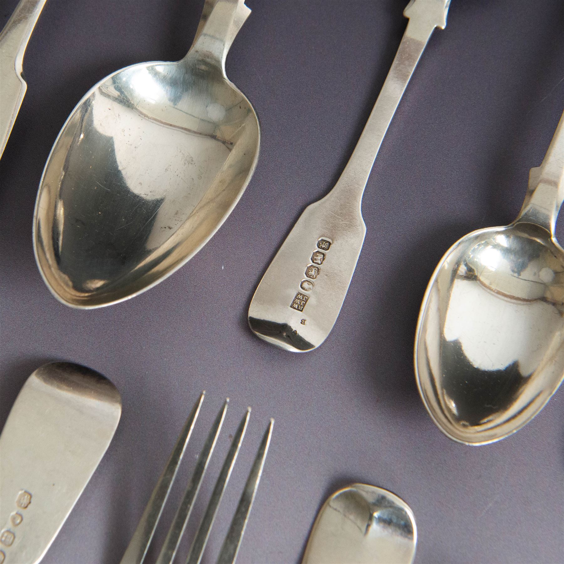 Set of Victorian silver Fiddle pattern cutlery for six place settings, comprising two table spoons, six dessert spoons, six table forks and six dessert forks, all engraved with initial to terminal, table spoons and dessert spoons hallmarked Robert Williams & Sons, Exeter 1848, forks hallmarked Henry Holland, London 1847