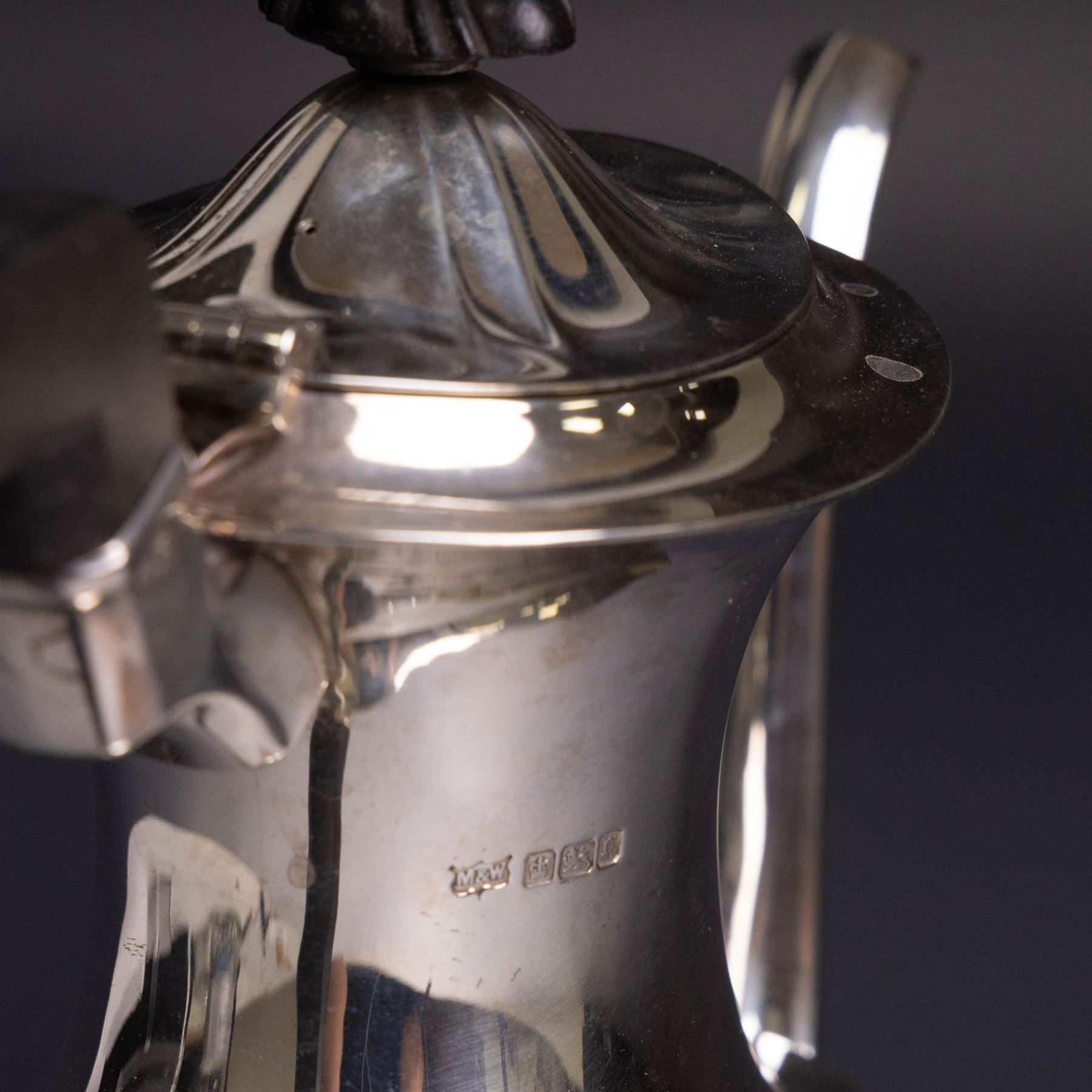 Edwardian silver coffee pot, of part fluted form with ebonised handle and finial, hallmarked Mappin & Webb Ltd, Sheffield 1908, H22cm