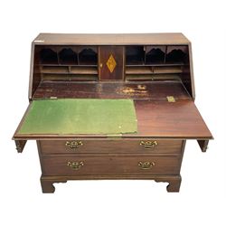 George III mahogany bureau, the conch inlaid fall front enclosing pigeon holes, shelves and central cupboard with inlaid flower motif, four graduating cock-beaded drawers below each with brass handles, lower moulded edge over shaped bracket feet