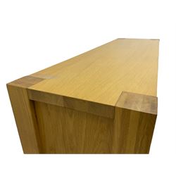 Light oak sideboard, fitted with three drawers and three cupboards