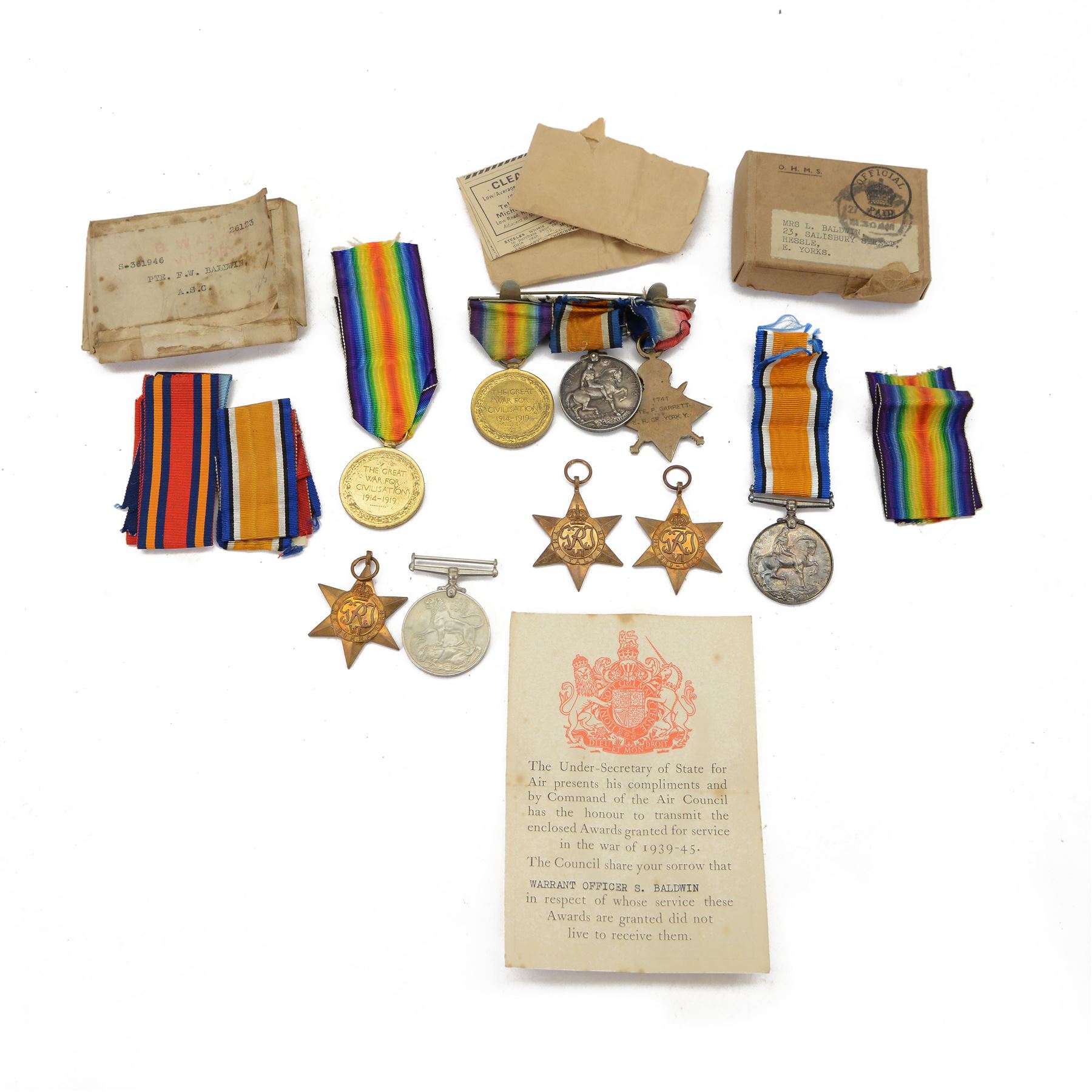 WWI trio of medals, comprising British War Medal, Victory Medal and 1914-15 Star, awarded to 1741 Pte. F. Garrett East Riding of Yorkshire Yeomanry, together Pair of medals comprising British War Medal and Victory medal awarded to S-361946 Pte. F.W. Baldwin Army Service Corps and WWII set of four medals comprising Defence medal, 1939-45 Star, Burma Star and Italy Star awarded to Warrent Officer S. Baldwin, in original medal box   