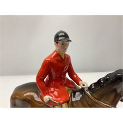 Beswick huntsman upon a bay horse no. 1501, with printed mark beneath, H22cm