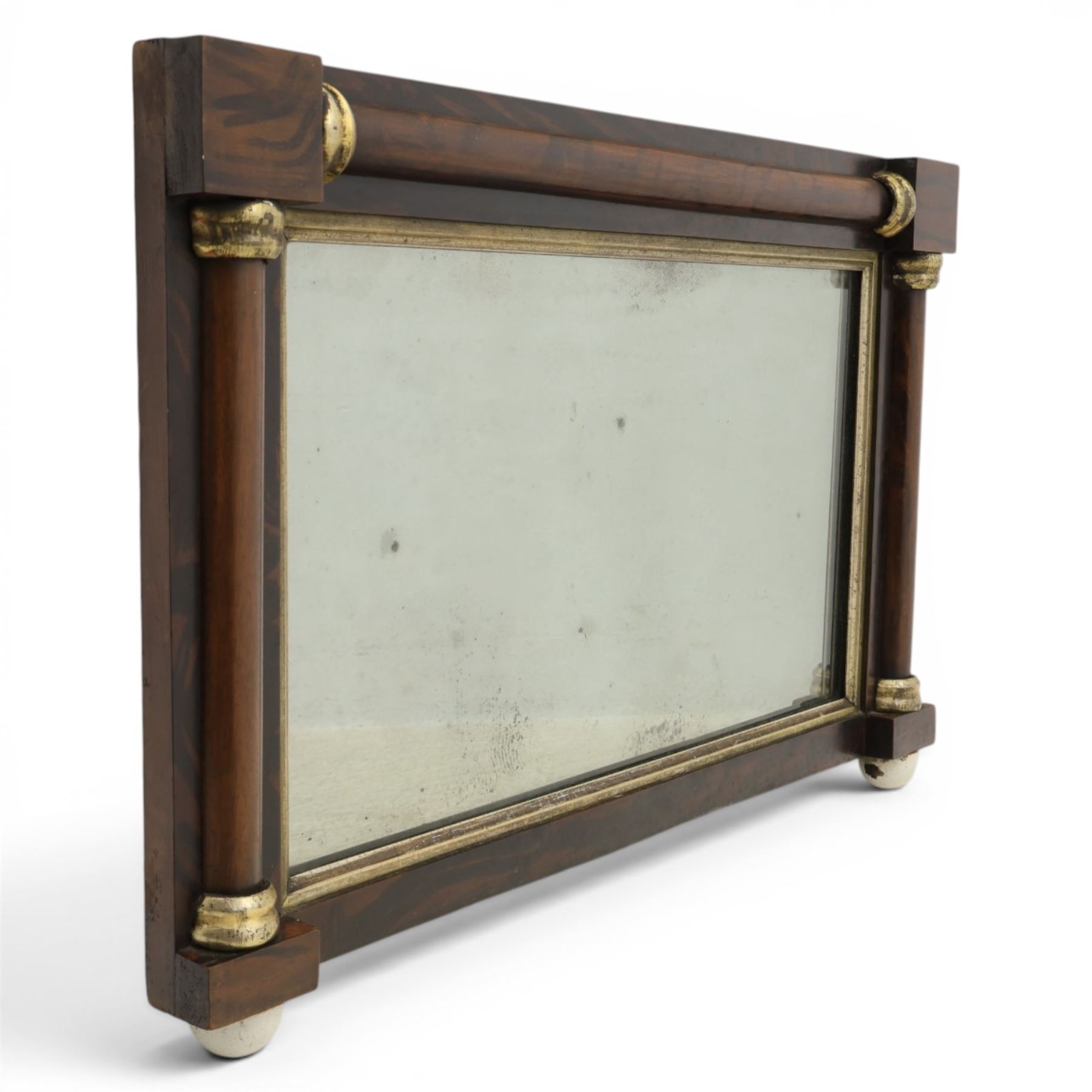 19th century brass and simulated rosewood mirror, with ceramic finials