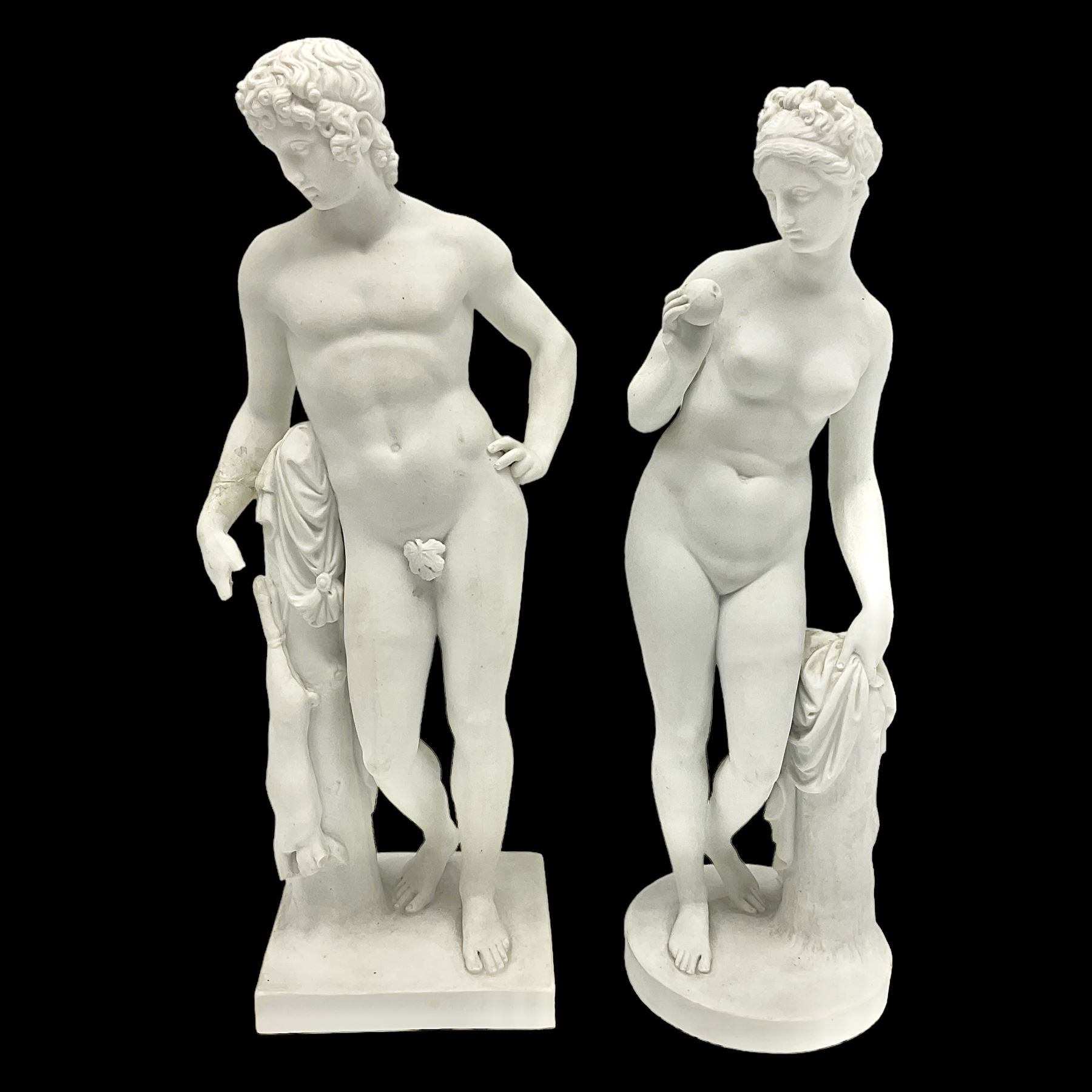 Royal Copenhagen Parian ware figure, modelled as Adonis, standing contrapposto by a tree trunk, together with a similar Parian ware figure, modelled as Venus with the Apple, both after Bertel Thorvaldsen and stamped Eneret to base with blue wave marks beneath, tallest H31.5cm