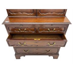 Late 19th century mahogany estate type cabinet, rectangular lunette carved top over cabinet enclosed by panelled doors, the interior fitted with pigeons holes, the chest with rectangular leaf carved moulded top over two short and three long graduating drawers with oak lining, egg and dart carved lower mould over bracket feet 