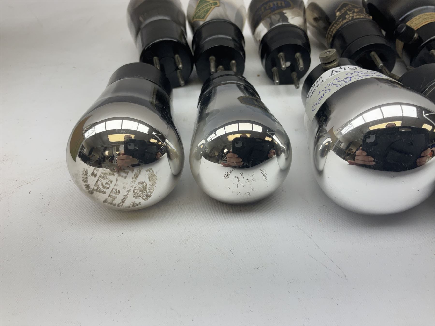 Eleven vintage radio valves, makes include Cossor, Osram, Philips etc. Including one small X-Ray tube.