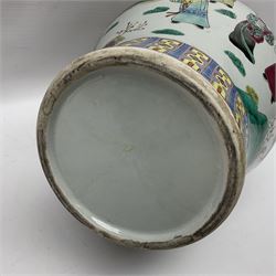 20th century Chinese Famille Rose vase, of baluster form with flared lobed rim and twin figural handles, decorated in polychrome enamel with figures dancing and playing instruments within a garden setting, H42cm