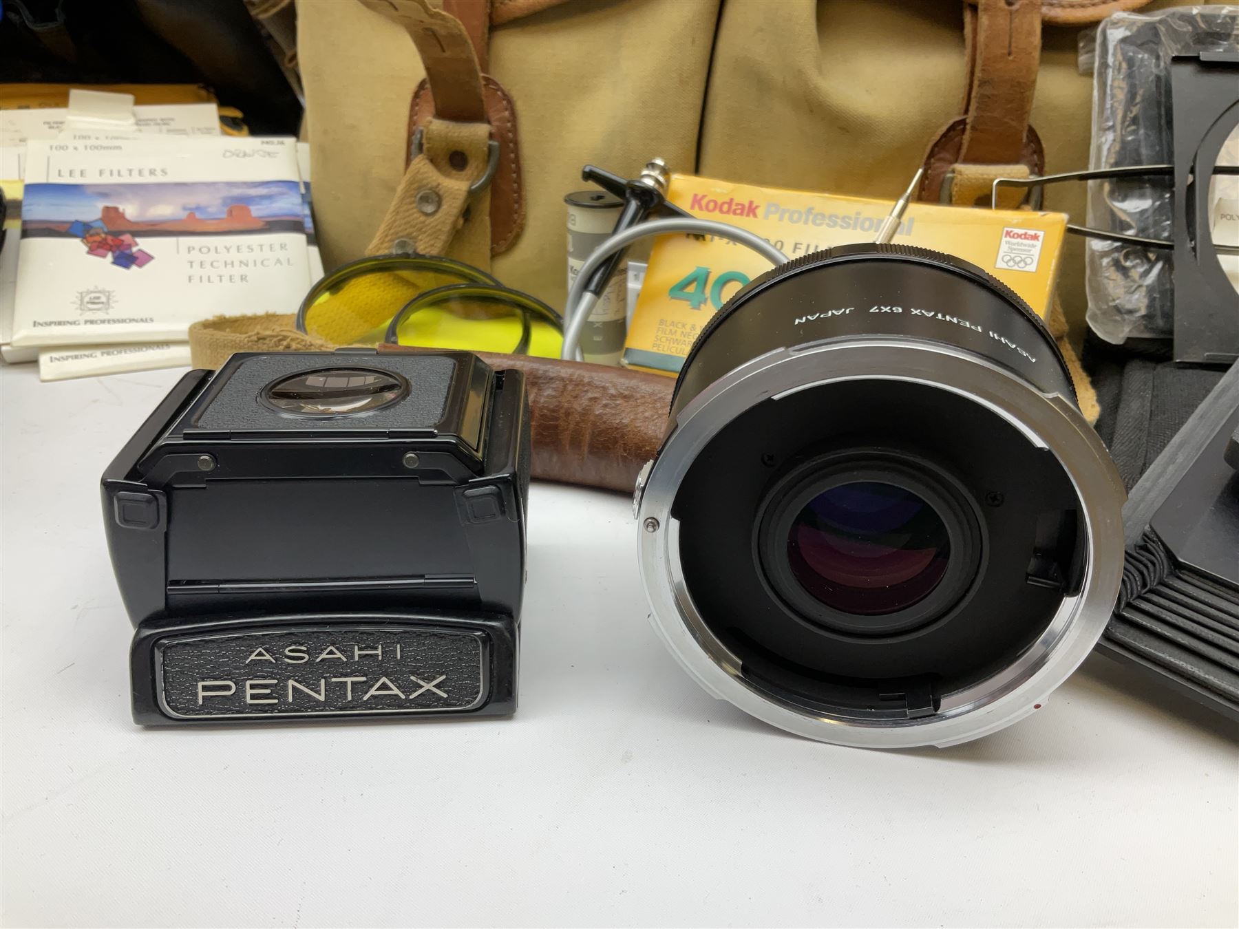 Pentax 67II camera with Asahi SMC Pentax - 6x7 ‘1:4 45mm’ lens, Asahi Takumar / 6x7 ‘1:4.5/75’ lens, Asahi Macro-Takumar / 6x7 ‘1:4/135’ lens, Asahi SMC Pentax - 6x7 ‘1:2.8 165mm’ lens, Asahi Pentax 6x7 rear converter ‘T6-2X’, lens filters and various other accessories, housed in a Billingham carry bag
