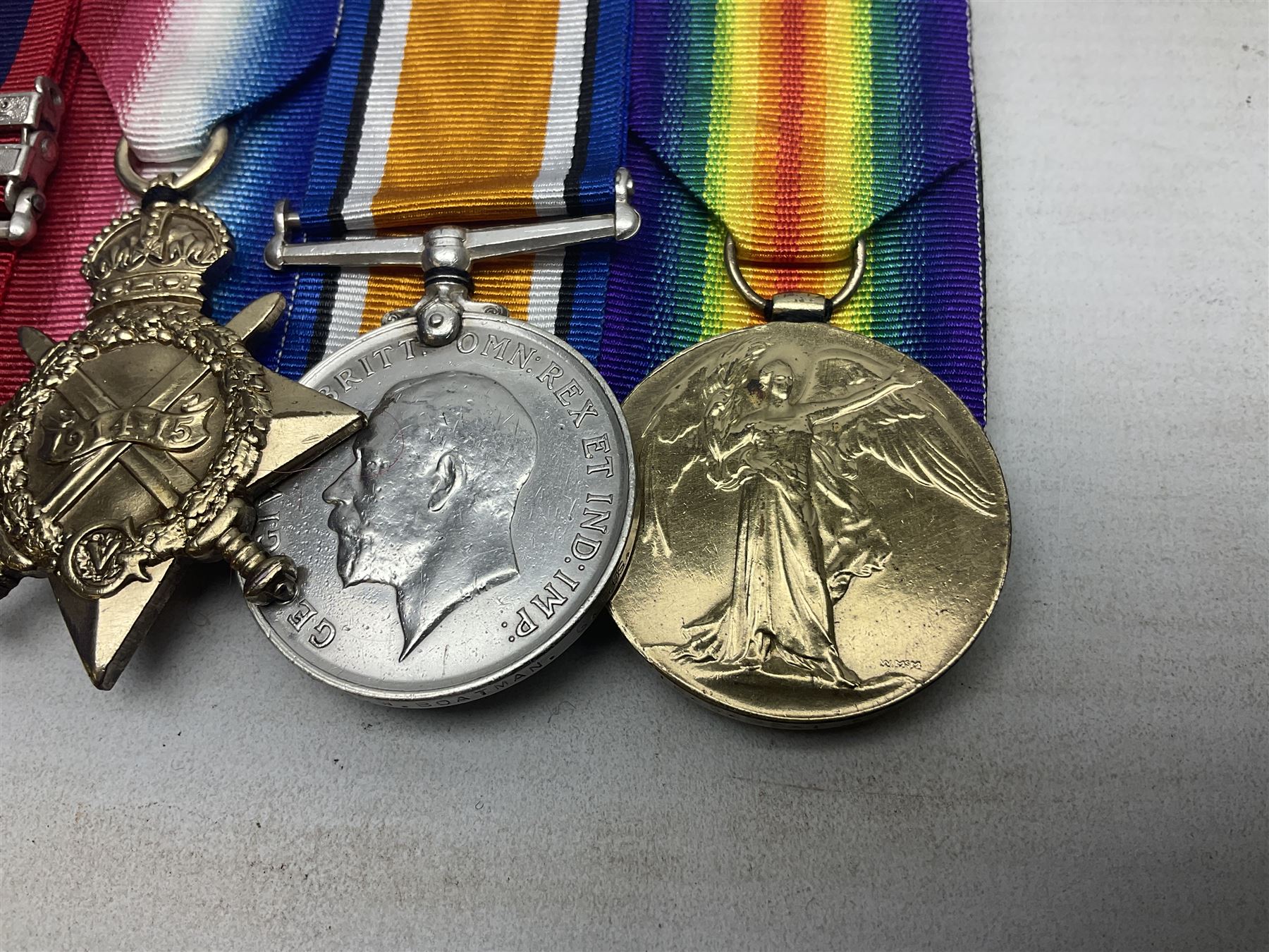 Boer War/WW1 group of four medals comprising Queens South Africa Medal with two clasps for South Africa 1902 and Cape Colony awarded to 6278 Pte. W. Boatman Essex Regt.; together with British War Medal, 1914-15 Star and Victory Medal awarded to 10849 Pte. W. Boatman G. Gds.; all with ribbons and mounted for display on card; some photocopied biographical information.