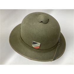 Five reproduction German WW2 hats comprising Wehrmacht olive tropical helmet, Heer officer's peaked cap, two M43 caps and Field side cap (5)