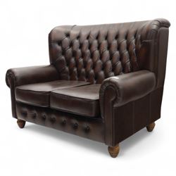 Thomas Lloyd  - two-seater settee, brown leather,  button upholstered back, cushion seats, and wide scrolled arms, raised on bun feet