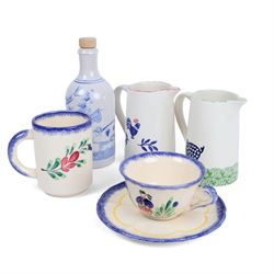 Two Kensington Potteries jugs, together with hand painted German bottle and Fousenant mug,...