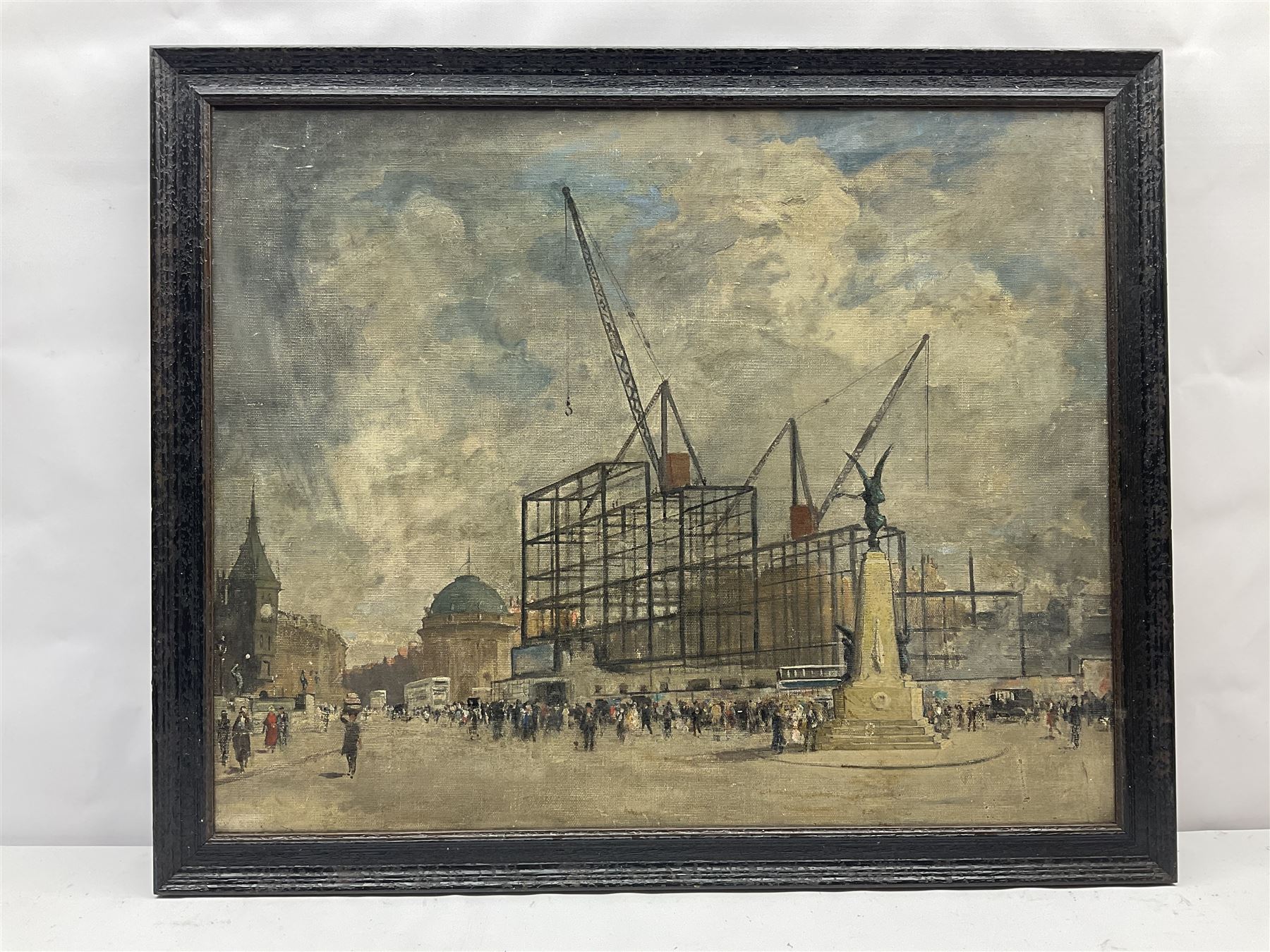 English School (Early 20th century): The Construction of the Queen's Hotel Leeds, oil on canvas unsigned 60cm x 75cm
Notes: The first railway hotel on this site was opened in 1863 for the Midland Railway. The Midland Railway was taken over by the London, Midland and Scottish Railway and in 1935 it was decided to demolish the old building and build a grand new one. This was officially opened on 12 November 1937, by the Princess Royal and Lord Harewood. The architect was W. H. Hamlyn 