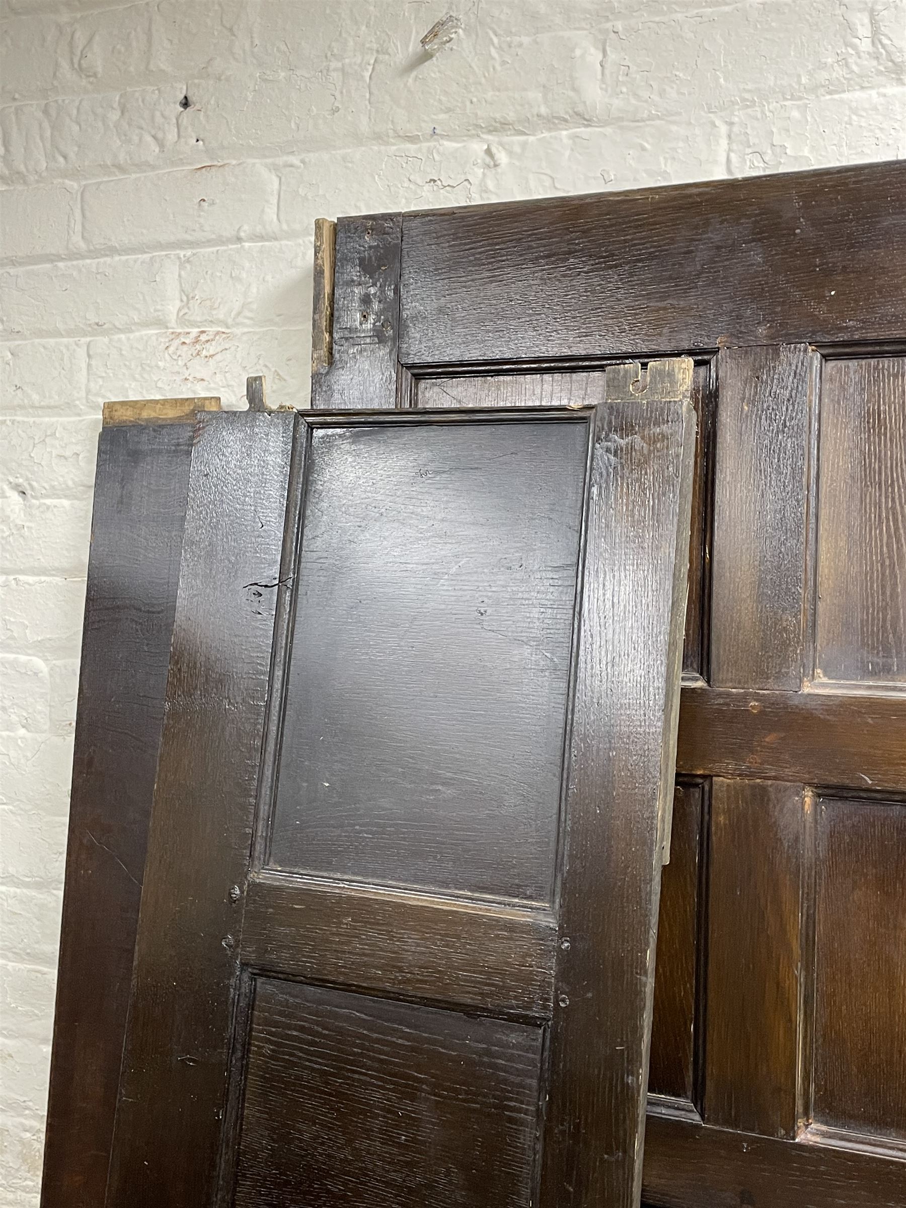 17th century style oak 4' four poster bed, high panelled back with projecting canopy cornice and panelled roof, turned posts with panelled front