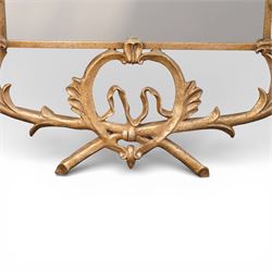 Large metal framed wall mirror, of rectangular form within an ornate openwork frame cast with scrolling foliate decoration and pierced cresting, finished in a gilt tone