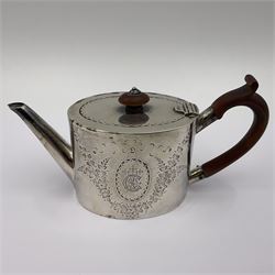George III silver bachelors teapot, of oval form with wooden scroll handle and finial, the body chased with armorial crest and ribbon swag and foliate detail, hallmarked Samuel Godbehere & Edward Wigan, London 1793, including handle H9cm
