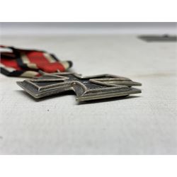 WW2 German Iron Cross 2nd Class with ribbon, ring stamped 44; and original issue packet; together with a copy of a WW2 Iron Cross