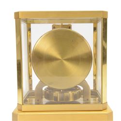 Jaeger-LeCoultre Atmos Clock - Caliber 528-6, 
gold-plated brass with glass panels, 15 jewel movement with atmospheric bellows winding motor, serial number 161881, circa 1960s, with engraved presentation plaque for W.W. Clayton, Canton Golf Club, 1964, in maker's box with instruction booklet, minute hand detached, H23.5xW21xD16cm