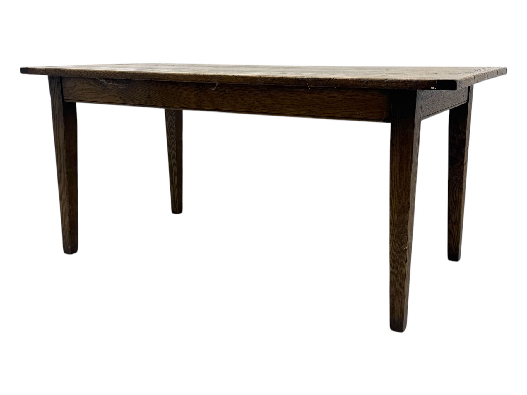 Late 20th century oak farmhouse table, rectangular plank top with breadboard ends and frieze drawer, on square tapered supports