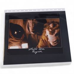 Collection of signed stills and promotional photographs, mostly Sci-Fi TV and film related, including Andy Serkis, Warwick Davis, James Earl Jones, Leroy James, Leonard Nimoy, Billy West, Robert Vaughn, Shane Rimmer, Ethan Phillips etc, all with certificates of authenticity, contained within dark green album