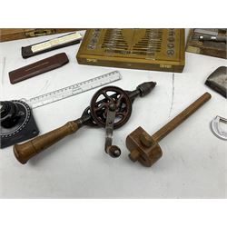 Various tools including boxed set of taps and dies, hand drill, set square, feeler gauges, micrometer screw gauge, steel rules, drawing instruments etc