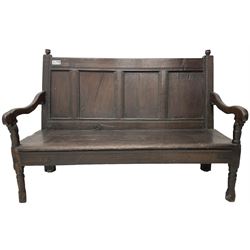 18th century oak hall bench or settle, quadruple panelled back with moulded rails, over a solid seat, raised on front turned supports