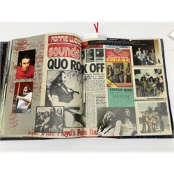 Status Quo: The Official 40th Anniversary Limited Edition book No.926/3000 with certificate signed by Rossi and Parfitt. Duplicate signatures by Rossi and Parfitt on pages within the book. Denim dustjacket; 'From The Makers Of ....' boxed set of three LP records in circular blue tin; and quantity of tour carrier bags