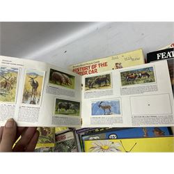 Over eighty trade card albums by Brooke Bond, Lyons, PG Tips, Hornimans, Ty-Phoo etc including some duplicates; and large quantity of loose trade cards