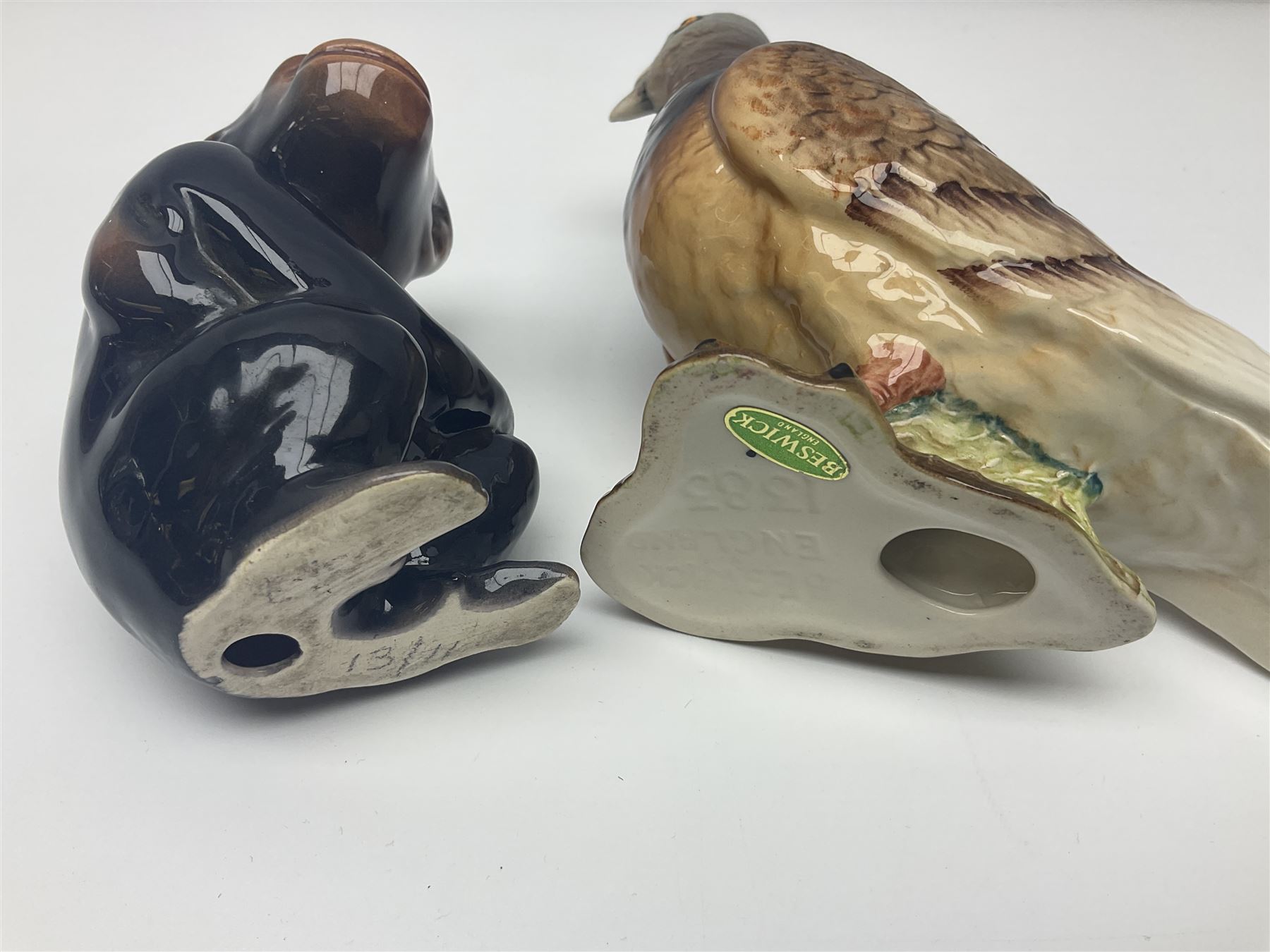 Large Sylvac monkey together with three smaller monkeys, together with Beswick Pigeon no 1383, Melba Ware hippo and baby and Royal Dux elephant 