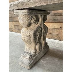 Cast stone garden Rams Head bench, two pillars set with architectural rams heads, rectangular slab seat