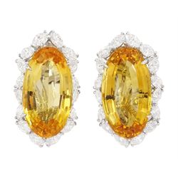 Pair of 18ct white gold oval cut citrine and marquise cut diamond cluster clip on earrings, total citrine weight approx 10.95 carat
