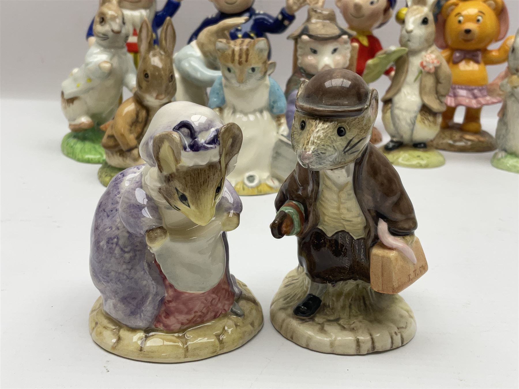 Twelve Royal Albert Beatrix Potter figures, including Mr Alderman Ptolemy, Peter Rabbit and This Pig Had None, etc, some boxed, together with four Royal Worcester Noddy figures, including Big Ears and PC Plod, boxed